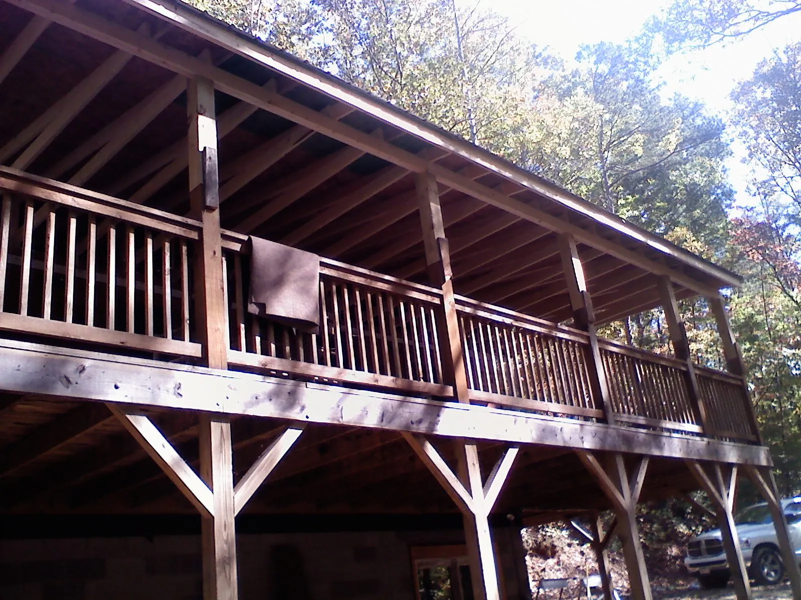 Timber framing under a new elevated porch and deck — Roof Leak Repair in Wake Forest by Roofing Brothers